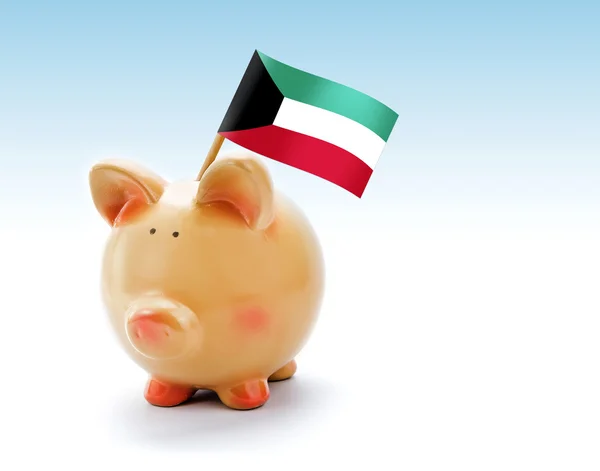 Piggy bank a Kuvait nemzeti zászlaja — Stock Fotó