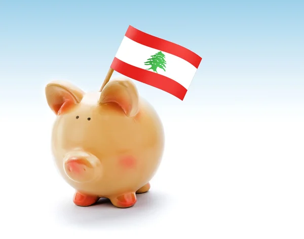 Piggy bank a Libanon zászlaja — Stock Fotó