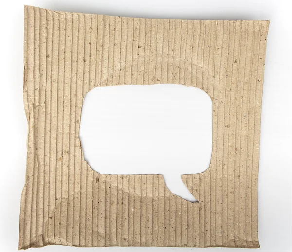 Old cardboard paper with speech bubble hole in the middle — Stock Photo, Image