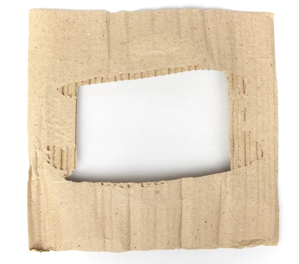 Old cardboard paper with hole in the middle — Stock Photo, Image