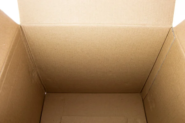 Dentro de uma caixa de papelão quadrado vazio — Fotografia de Stock