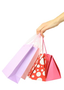 renkli alışveriş torbaları üzerinde beyaz izole tutmak el