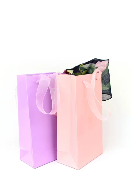 Pastel pink and lilac shopping bags isolated on white — Stock Photo, Image