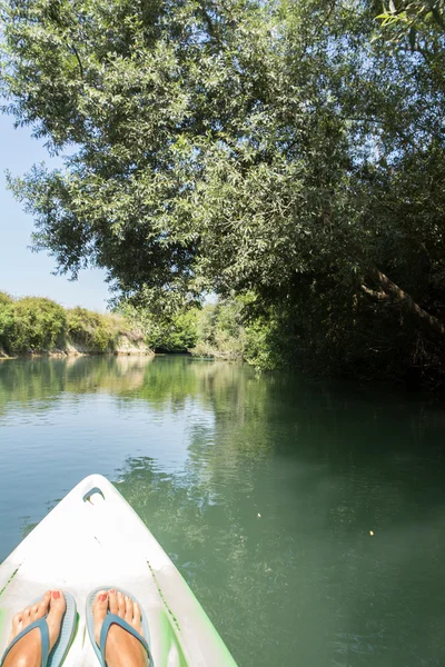 River view from the kayak, with the kayak front part on the picture — Stock Photo, Image