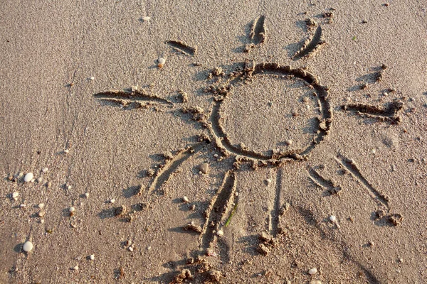 Αμμώδης παραλία με το χέρι που ήλιος φόντο — Φωτογραφία Αρχείου