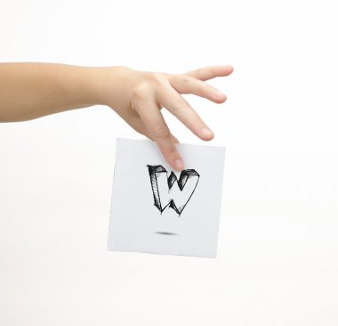 Hand holding a piece of paper with sketchy capital letter W, isolated on white.