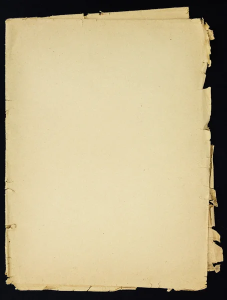 Gamla grunge vikta pappersark, isolerad på svart bakgrund. — Stockfoto