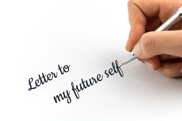 Scrittura a mano "Lettera al mio futuro sé" su foglio bianco di carta . — Foto Stock