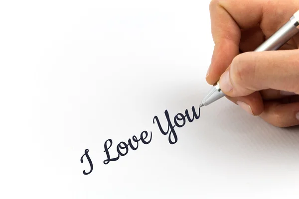 Χέρι που γράφει "I Love You" σε λευκό φύλλο χαρτιού. — Φωτογραφία Αρχείου