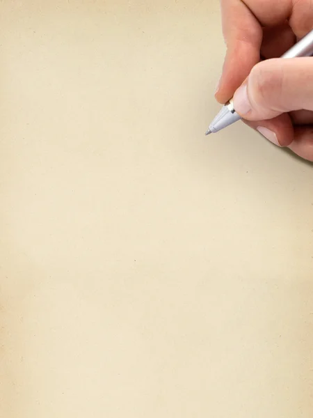 Hand skriva på gamla grungy tomma pappersark. — Stockfoto