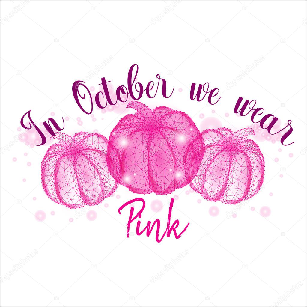 Breast cancer awareness month concept with three pumpkins and text In October we wear pink