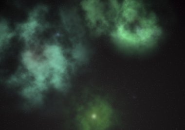 Uzayda bir yıldız alanı ve bir nebula