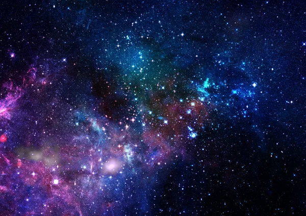 Uzayda bir yıldız alanı ve bir nebula