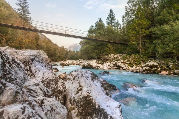 Awesome late summer and autumn mood at Soca River with crystal clear turquoise blue water. Kranjska Gora, Slovenia, Julian Alps, Soca, Vrsic Pass