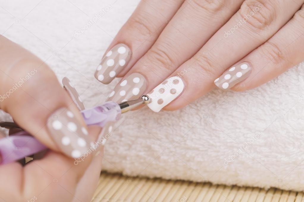 Feminine nails with nude and white polish