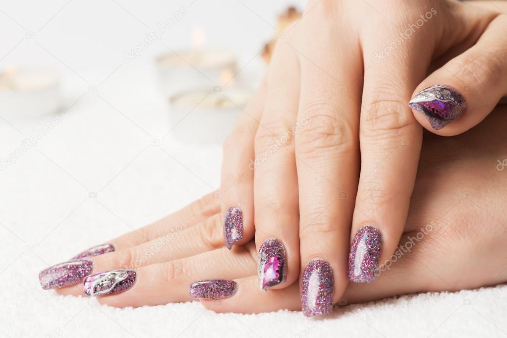 Fingernails with interesting glitter nail art