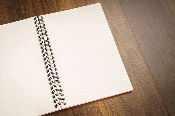 Note book on a wooden desk — Stock Photo, Image