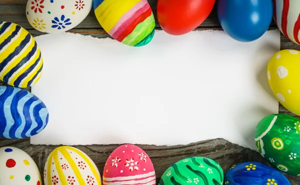 Easter eggs with gift card — Stock Photo, Image