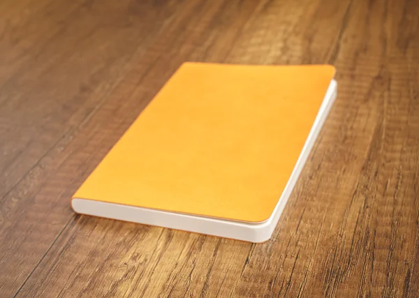 Book mock up on wooden table — Stock Photo, Image