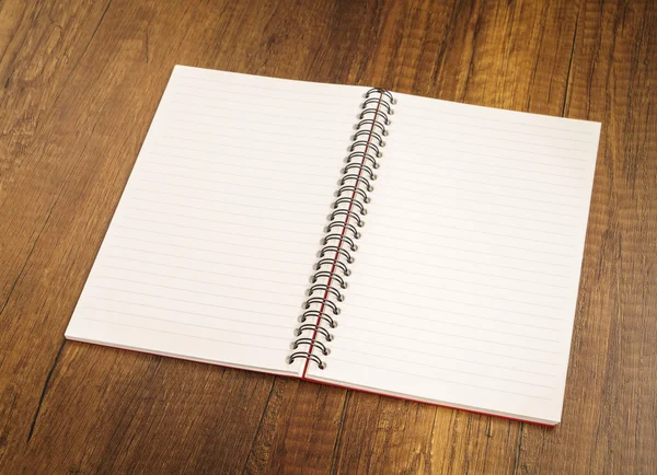 Note book on a wooden desk — Stock Photo, Image