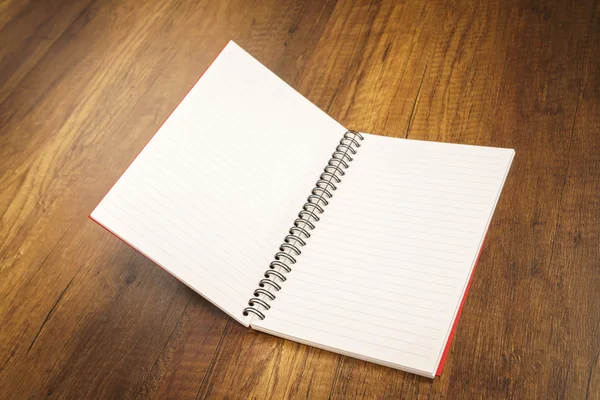 Note book on a wooden desk — Stock Photo, Image