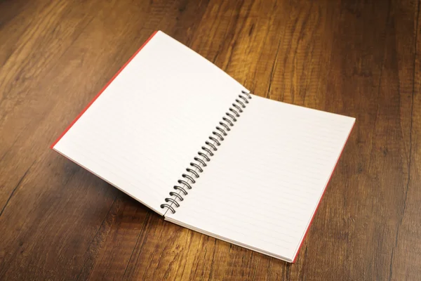 Note book on a wooden desk — Stock Photo, Image