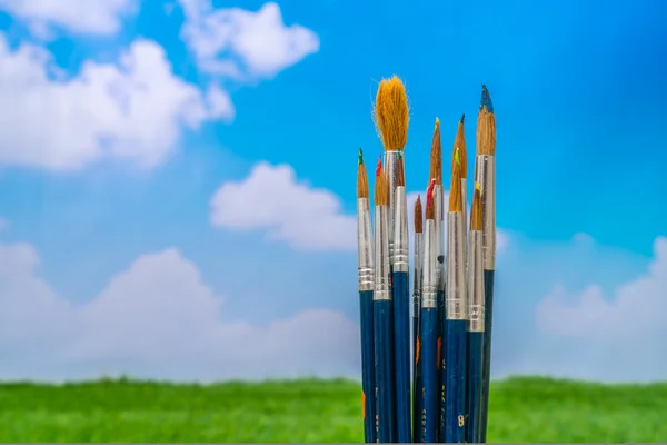 Paintbrush with blue sky — Stock Photo, Image