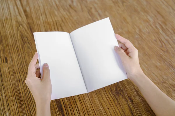 Empty opened book on wooden table — Stock Photo, Image