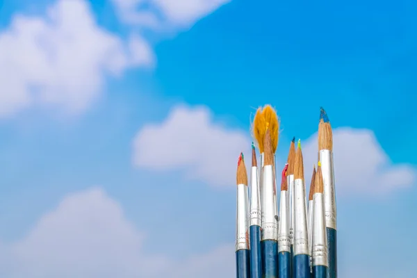 Paintbrush with blue sky — Stock Photo, Image