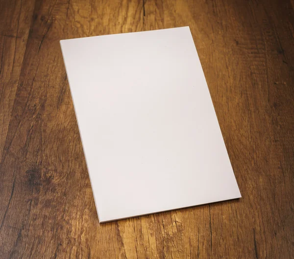 Book mock up on wooden table — Stock Photo, Image