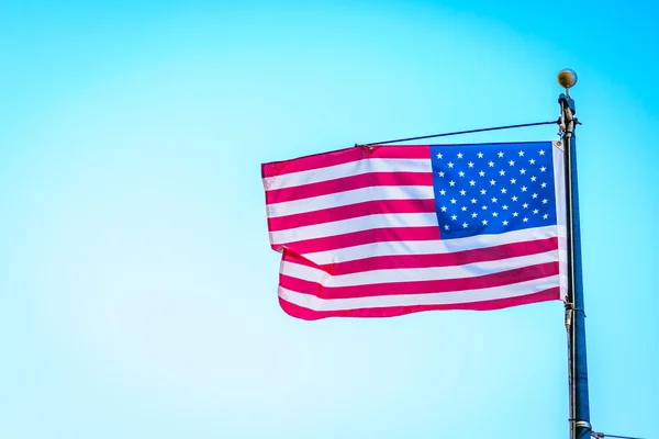 American flag on blue sky — Stock Photo, Image