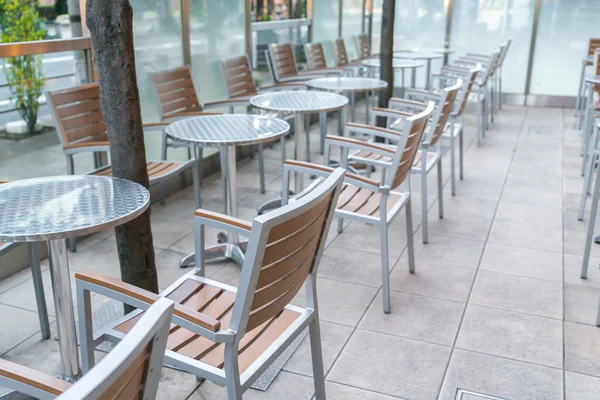 Tables and chairs in restaurant — Stock Photo, Image