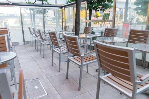 Tables and chairs in restaurant — Stock Photo, Image