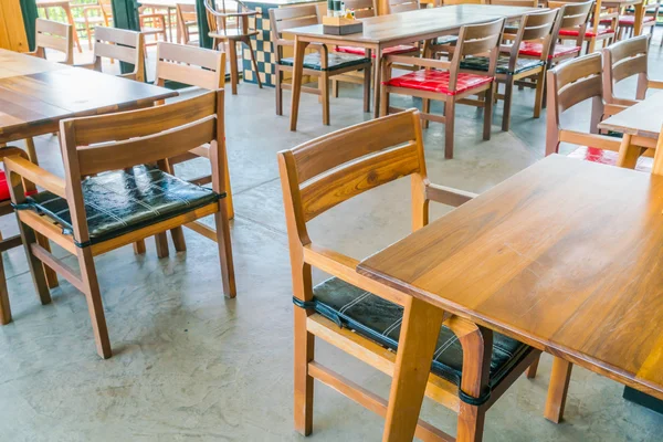 Tables and chairs in restaurant — Stock Photo, Image