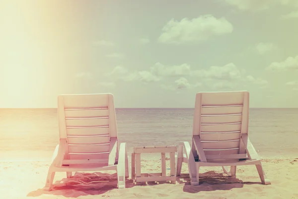 Beach chairs on tropical white sand beach ( Filtered image proce — Stock Photo, Image