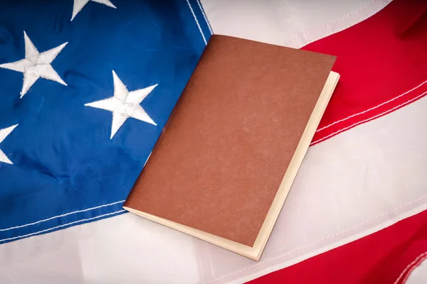 Passport on an American flag — Stock Photo, Image