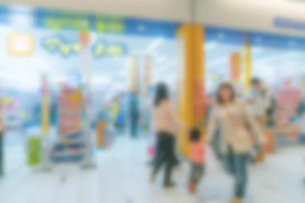 Abstraktní rozostření lidi v nákupním centru — Stock fotografie
