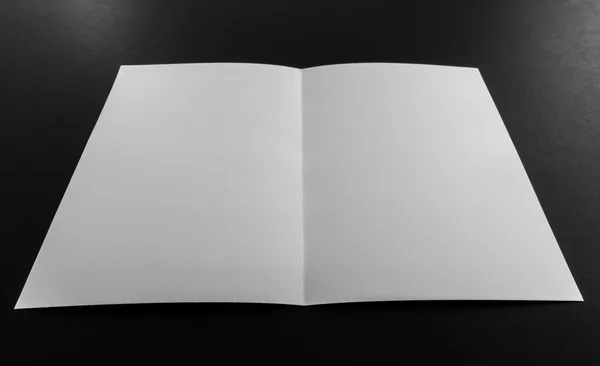 Bifold white template paper on black background . — Stock Photo, Image