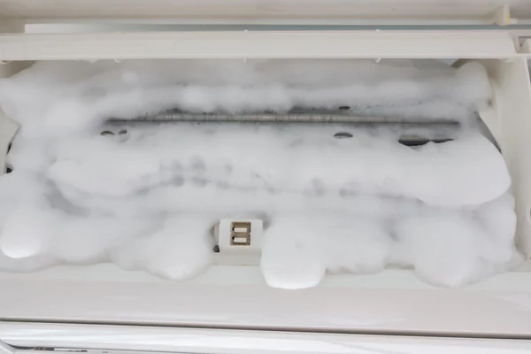 Air conditioner cleaning with washing foam . — Stock Photo, Image