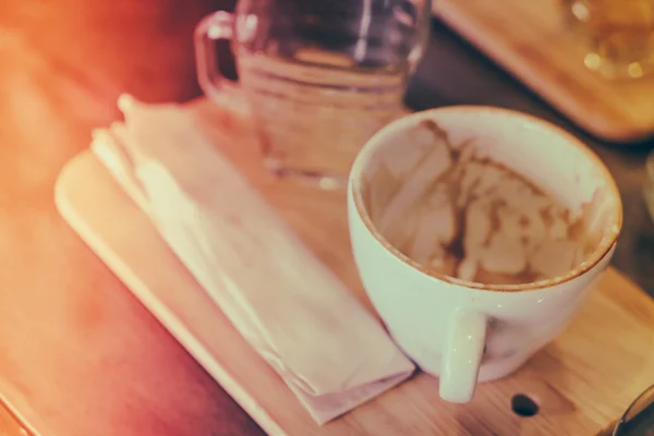 Empty cup of coffee on wooden table ( Filtered image processed v — Stock Photo, Image