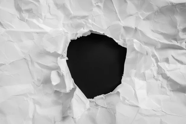 Torn paper on black background . — Stock Photo, Image