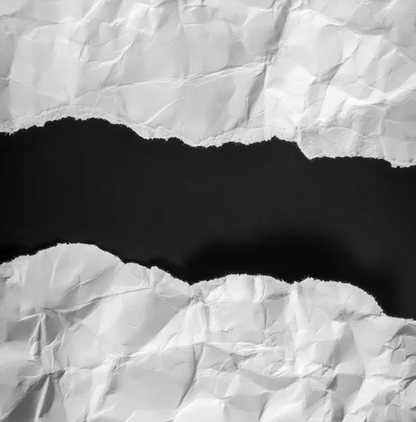 Torn paper on black background . — Stock Photo, Image