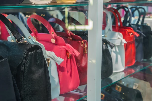 Row of Ladies leather handbags . — Stock Photo, Image