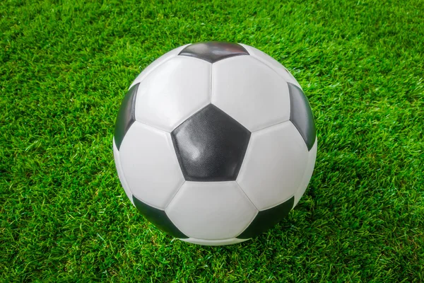 Soccer ball on green grass . — Stock Photo, Image