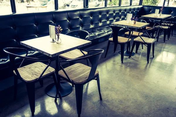 Tables and chairs in restaurant ( Filtered image processed vinta — Stock Photo, Image