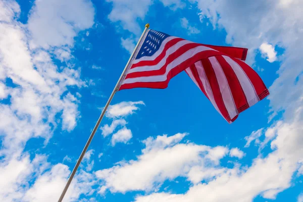 American flag on blue sky . — Stock Photo, Image