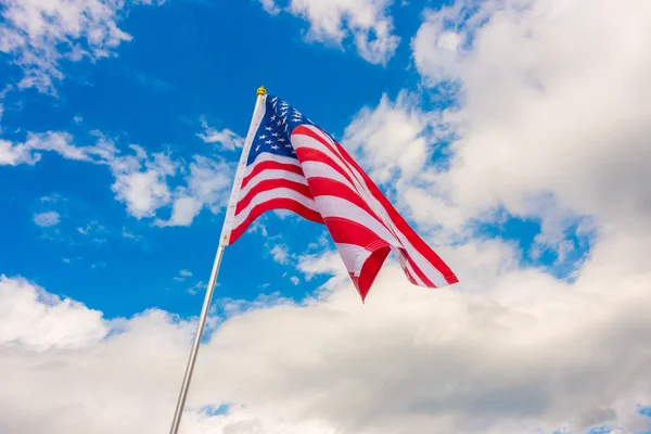 American flag on blue sky . — Stock Photo, Image