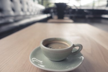 Ahşap masa fincan Espresso kahve. (Filtre uygulanmış görüntü işlenen v