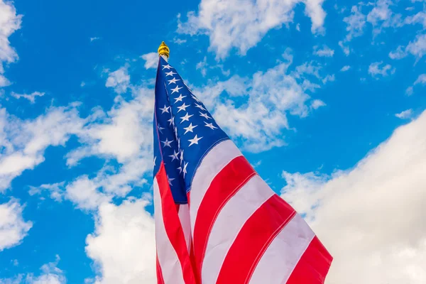 American flag on blue sky . — Stock Photo, Image