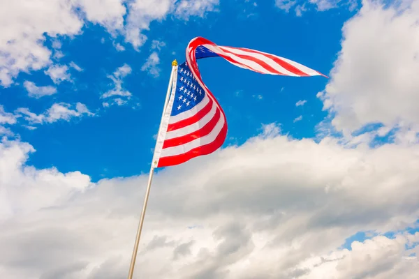 American flag on blue sky . — Stock Photo, Image